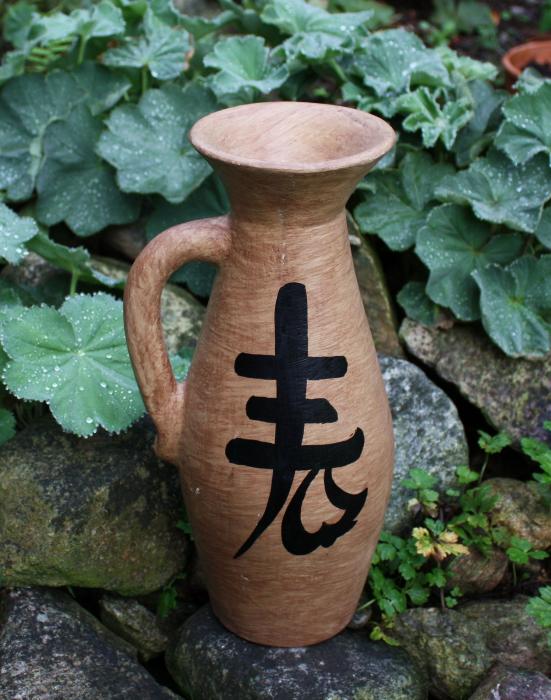 Vase mit Kalligraphie